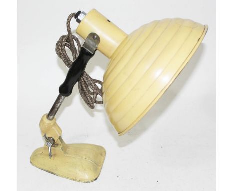A retro beehive adjustable lamp.  