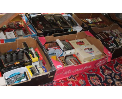 Six boxes (under table) containing boxed model cars including Matchbox, Maisto, Solido, Burago, Corgi and Lledo Classic Cars 