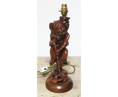 A Chinese carved table lamp, height 40cm.  