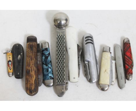 A box of pen knives including a vintage puma combination knife and priest, horn handled etc.  