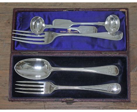 A mixed lot of hallmarked silver comprising a cased fork and spoon, two mustard spoons and another fork.  