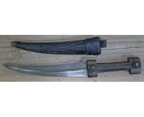 A 19th century North African Jambiya dagger, 8 1/4" slightly curved double edged damascus blade with central rib, polished ho