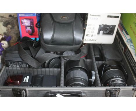 Canon EOS650D camera in Jessops hard case, with Canon Ultrasonic 28-200 mm zoom lens, Sigma 70-300mm APO Macro Super lens, Si