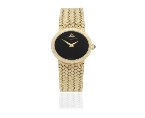 Baume &amp; Mercier. A lady's 18K gold manual wind bracelet watchReference: 38235 9Date: Circa 1980Movement: 17-jewel Cal.BM7