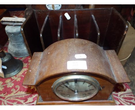 A mid-20thC walnut cased dome top mantel clock with silvered dial and Roman numerals together with a five section mahogany ta