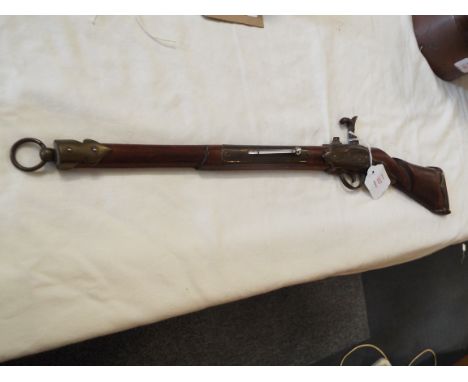 A mid-20thC thermometer in the form of a flintlock rifle