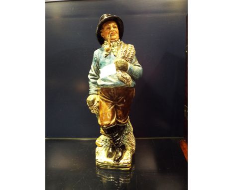 A late Victorian German B&L Gesetzl Gesch Majolica decanter modelled as a fisherman, impressed marks to base (hat A/F)     Ha