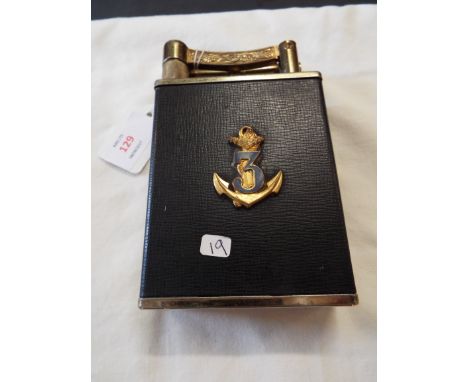 A Dunhill style over sized table lighter with applied anchor decoration