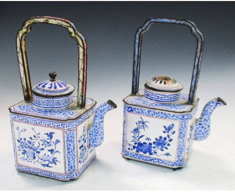 Two similar late 18th/early 19th century enamel wine ewers and covers, both with handles raised over the rounded rectangular 