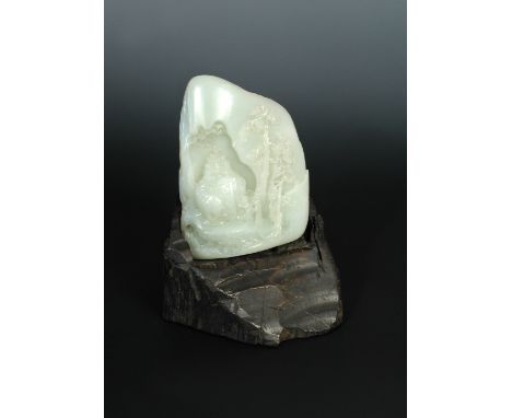 A pale green nephrite jade boulder carving, Qing Dynasty, 18th century, carved in deep relief on one side with four children 