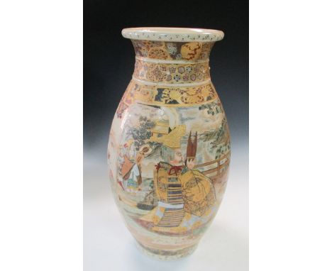 A late 19th century Satsuma vase, the neck with brocaded bands, the ovoid body with two reserves of courtly musicians playing