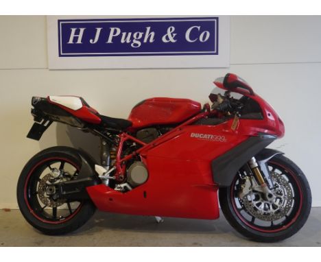 Ducati 999s motorcycle. 2005. 998cc. Runs but needs new battery. Comes with folder of history and handbook. Frame No. ZDMH400