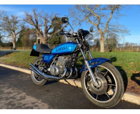 Kawasaki KH400 motorcycle. 1976. Fitted with alloy wheels, triple disc and mono shock conversion. Alloy swing arm, chrome exp