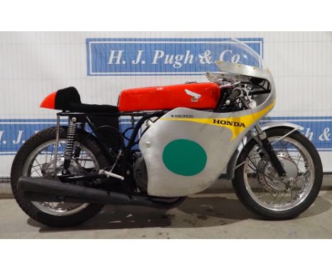 Honda 250/4 RE162 Mike Hailwood race replica motorcycle. Has been in a collection for many years and never ridden. Runs well.
