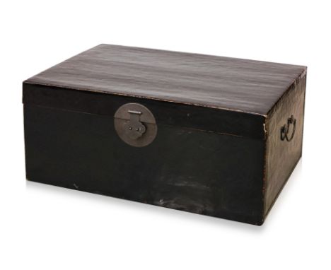 A BLACK LACQUERED TRUNK
Rectangular wooden trunk with brass mounts and loop handles to each side, floral lined interior with 