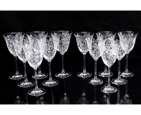 TWO SETS OF ETCHED WINE GLASSES Comprising a set of ten large red wine glasses, each decorated with etched scrolling vine lea