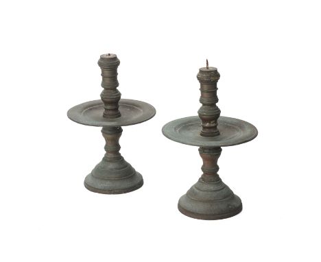 A PAIR OF METALWARE PRICKET ALTAR CANDLESTICKS
With ring turned stem and large drip pan
24.5cm high
Condition: Condition Repo