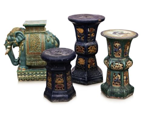 A GROUP OF FOUR CERAMIC PLANT STANDS
Comprising a three circular stands and one in the form of an elephant
39cm to 61cm high
