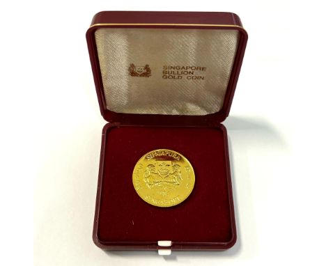 A SINGAPORE 1984 $10 DOLLAR GOLD COIN
Struck in .999 fine gold, obverse with Singapore coat of arms and date below, reverse w