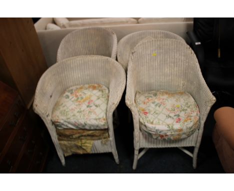 FOUR WHITE PAINTED LLOYD LOOM CHAIRS