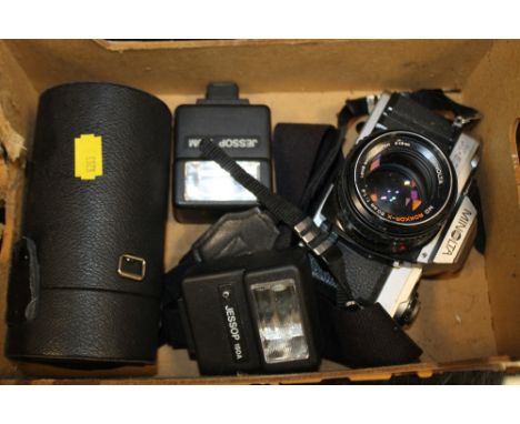 A VINTAGE MINOLTA X-500 CAMERA AND ACCESSORIES 