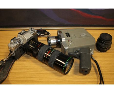 A VINTAGE MINOLTA XG-M CAMERA TOGETHER WITH A CROWN AUTO ZOOM 201 CINECAMERA