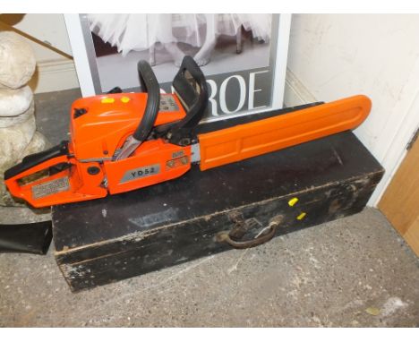 A CHAINSAW TOGETHER WITH A VINTAGE TOOLBOX AND CONTENTS