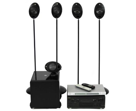 A PSW2010 AV receiver, other musical equipment, four KEF freestanding surround sound speakers, on cylindrical stems, 118cm H,