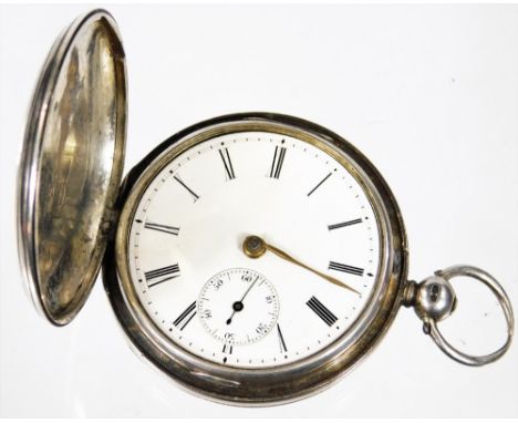 A Victorian silver hunter pocket watch, with engine turned case, plain ring handle, 4cm Dia. Roman numeric dial with subsidia