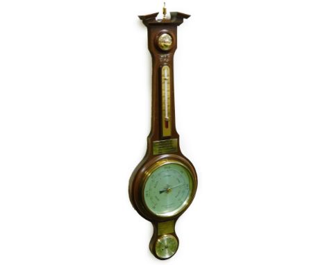 A late 20thC mahogany banjo barometer and thermometer, in a broken swan neck pedimented case, with a bullseye glass, above th
