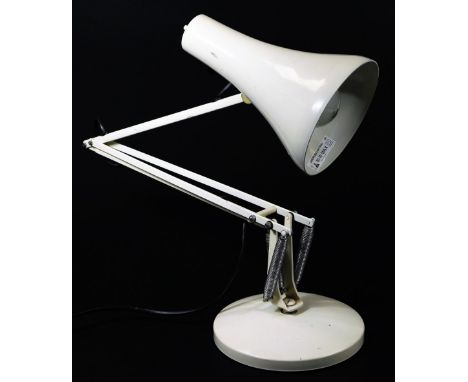 A late 20thC angle poise lamp, with cone shaped shade and shaped stem on circular foot, when extended 90cm H.