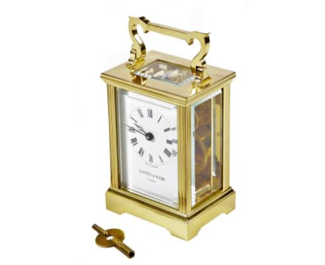 A 20thC Mappin &amp; Webb carriage clock, with a five part glass case, 5.5cm W, Roman numeric dial, on bracket feet, with a k