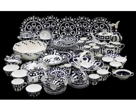 A comprehensive early 20thC dinner service, in blue and white floral pattern, to include ewer, 28cm H, serving bowl, plates, 