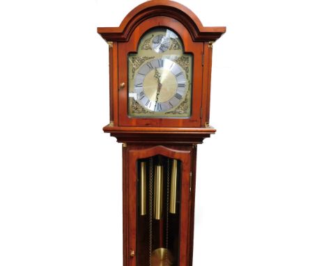 A 20thC yew wood longcase clock, the swan neck pedimented hood above a full length serpentine glazed door, flanked by quarter