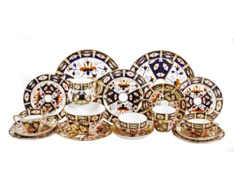 A Royal Crown Derby Imari pattern part tea service, to include two serving plates, 23cm Dia. cups, saucers, jug, etc, varying