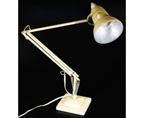 A mid 20thC Bauhaus design angle poise lamp, in cream with inverted cone shaped shade, when extended, 89cm H.