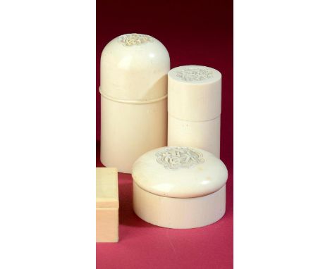 A set of three ivory containers  early 20th century the largest 11cm.; 4½ins high