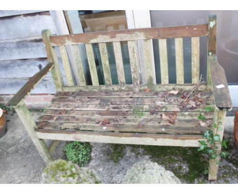 A teak slatted garden bench, 47 1/2" wide 