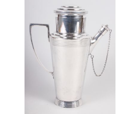 An Art Deco American style cocktail shaker, stamped "Mappin & Webb", 9 1/2" highCondition:Small dent under the handle, light 