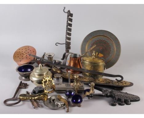 A wrought iron spiral candlestick, a copper chestnut roaster, a chest strap and five horse brasses and other metal wares 