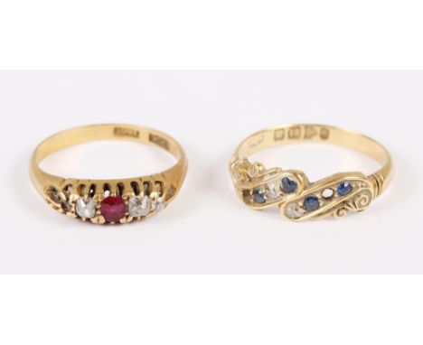 An 18ct gold, diamond and sapphire dress ring (two stones missing), size O, 2.9g, and a yellow metal, diamond and ruby dress 