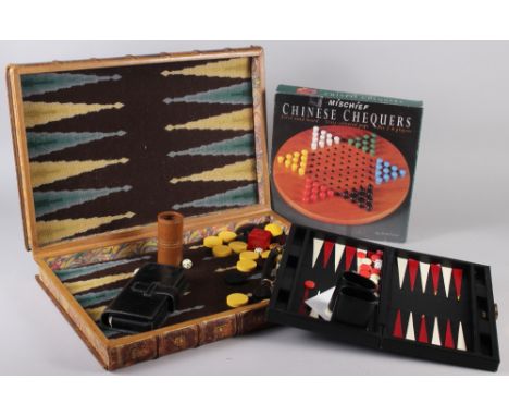 An Hermes leather bridge card case, a Smythson backgammon set (slight damages), a backgammon set, in faux leather-bound volum