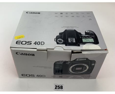 Canon EDS 40D digital camera in box with charger, strap, accessories and instructions