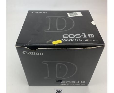 Canon EOS-1D Mark II digital camera in box with charger, accessories and instructions