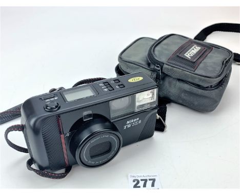 Nikon TW Zoom camera with spare batteries in case