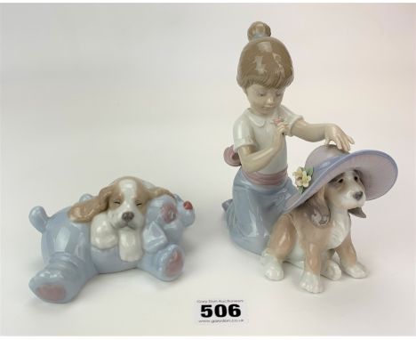 Lladro figure of girl with dog 6.5” high and Nao figure of sleeping dog 6” wide