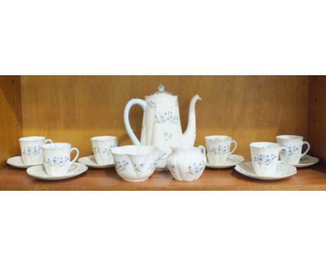 A Shelley tea service decorated in the 'Blue Rock' pattern, six each cups and saucers, teapot, cream jug and sugar bowl.