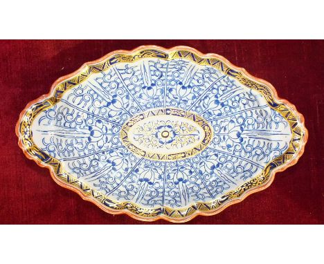 An 18th/19th century Flight Worcester oval dish decorated blue and gilt with underglaze blue crescent mark beneath, 'Royal Li