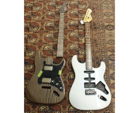 Two guitar bodies/necks for projects to include a zebra finish type body and neck with single-ply Guitar Anatomy guard, Tone 