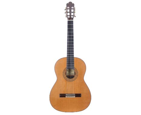 Manuel Raimundo 155 classical guitar, made in Spain; Back and sides: Indian rosewood, light clouding with heavier clouding sp